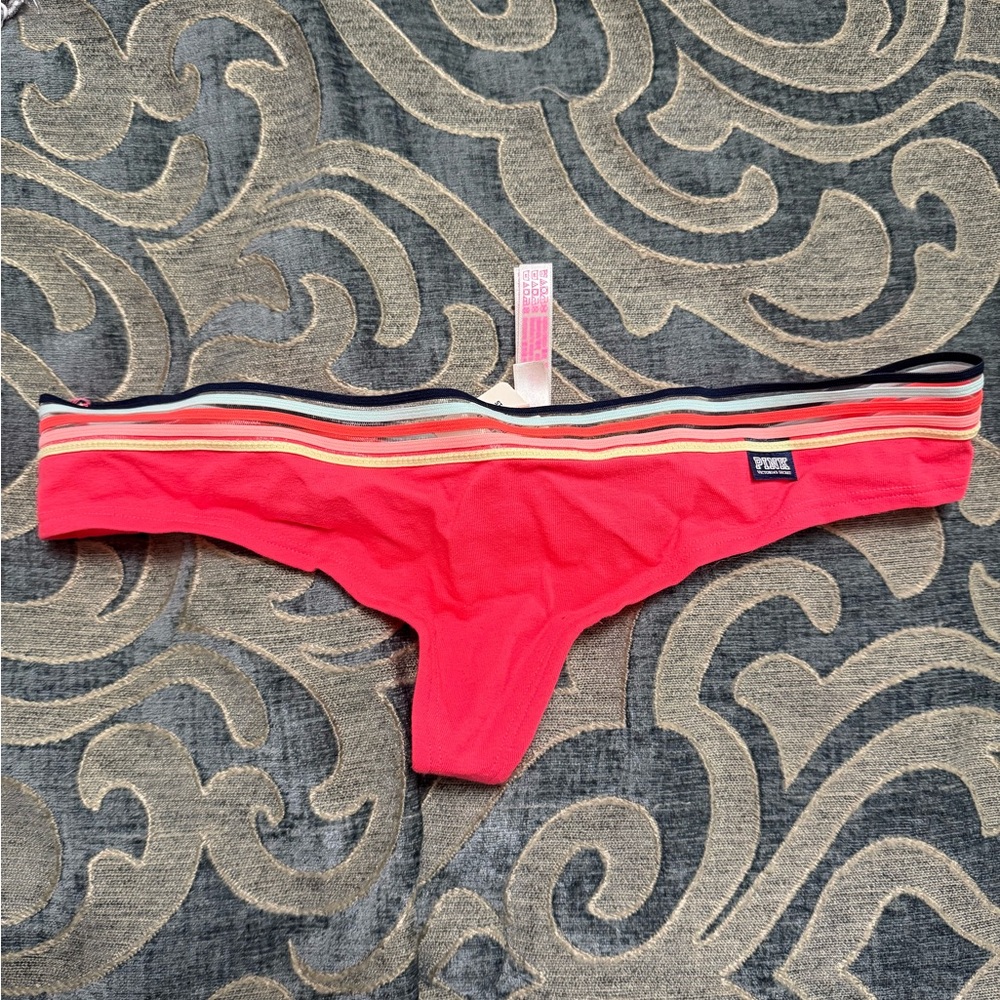 Pink thong size S
Brand new with tags